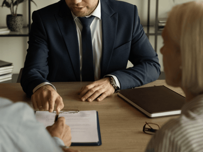 grandparents sitting across from desk of family law attorney